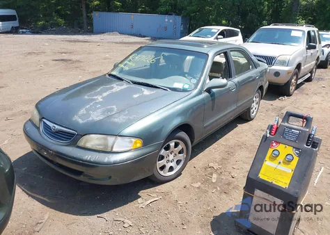 1999 Mazda 626 Es/Lx из США, поврежденный, VIN 1YVGF22C1X5836200